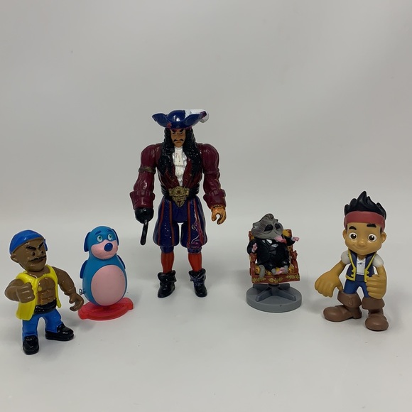 Disney Other - 7 piece toy lot:  pirates 🏴‍☠️, dog, and others, cake toppers, used